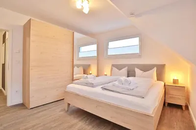 Ein Bett oder Betten in einem Zimmer der Unterkunft Ostseeglück Ostseeglueck