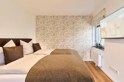 Ein Bett oder Betten in einem Zimmer der Unterkunft Morgenlicht