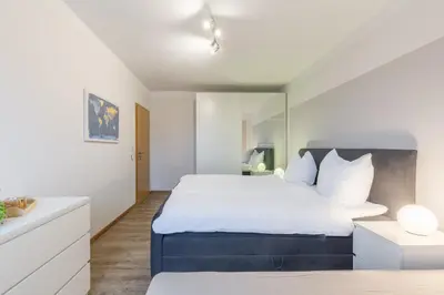 Ein Bett oder Betten in einem Zimmer der Unterkunft Ferienwohnung Erika