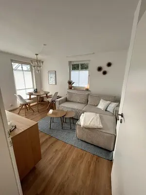 Ein Bett oder Betten in einem Zimmer der Unterkunft Sonnige & neu eingerichtete Ferienwohnung