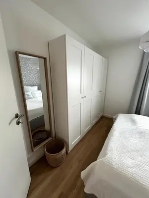 Ein Bett oder Betten in einem Zimmer der Unterkunft Sonnige & neu eingerichtete Ferienwohnung