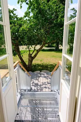 Ein Garten an der Unterkunft KVH FeWo Lübeck & Priwall für 19 Gäste im EG