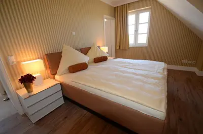 Ein Bett oder Betten in einem Zimmer der Unterkunft Ferienhaus 