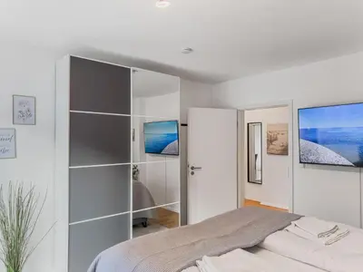 Ein Bett oder Betten in einem Zimmer der Unterkunft Objekt-Nr 7 - Hafen - Rose