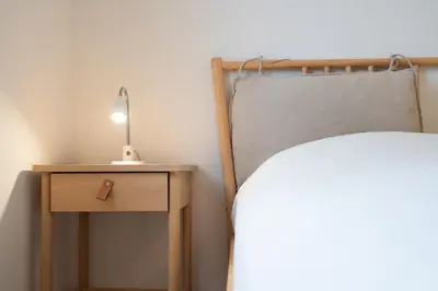 Ein Bett oder Betten in einem Zimmer der Unterkunft Wohnung 10