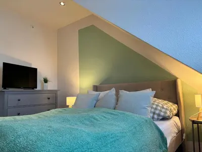 Ein Bett oder Betten in einem Zimmer der Unterkunft 4 Zimmer Ostseetraum