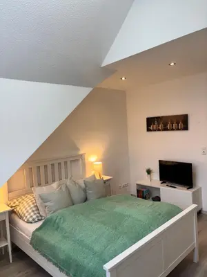 Ein Bett oder Betten in einem Zimmer der Unterkunft 4 Zimmer Ostseetraum