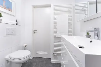 Ein Badezimmer in der Unterkunft Strandhotel Scharbeutz Oceanview Deluxe