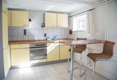 Küche/Küchenzeile in der Unterkunft Gästehaus Daheim - Appartement Souterrain
