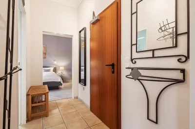 Ein Bett oder Betten in einem Zimmer der Unterkunft Gästehaus Daheim - Appartement 03