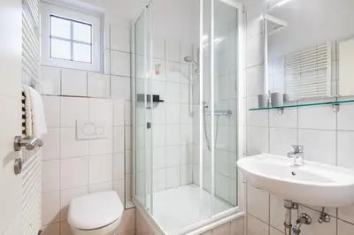 Ein Badezimmer in der Unterkunft Gästehaus Daheim - Appartement 03