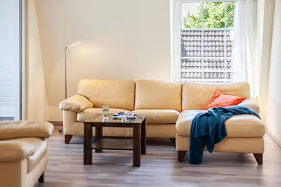 Ein Sitzbereich in der Unterkunft Gästehaus Daheim - DELUXE Appartement 10 mit Loggia
