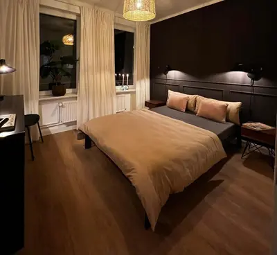 Ein Bett oder Betten in einem Zimmer der Unterkunft Boutique Apartment City Lübeck