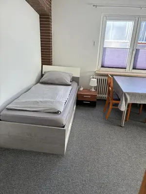 Ein Bett oder Betten in einem Zimmer der Unterkunft Freundliche Monteurwohnung