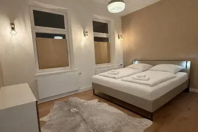 Ein Bett oder Betten in einem Zimmer der Unterkunft Modernes Loft Apartment in Lübeck