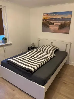 Ein Bett oder Betten in einem Zimmer der Unterkunft Schlafen in Lübeck