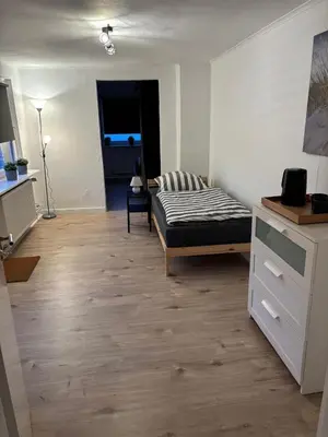 Ein Bett oder Betten in einem Zimmer der Unterkunft Schlafen in Lübeck