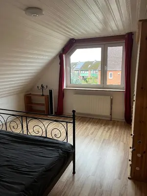 Ein Bett oder Betten in einem Zimmer der Unterkunft Familiennest