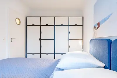 Ein Bett oder Betten in einem Zimmer der Unterkunft Haus Carpe Diem Strandnest