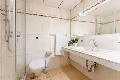 Ein Badezimmer in der Unterkunft An der Waldkapelle 26 min skat