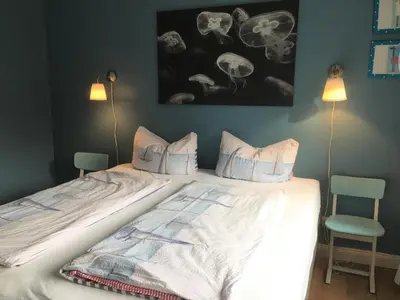 Ein Bett oder Betten in einem Zimmer der Unterkunft Strandperle 1 Timmendorfer Strand