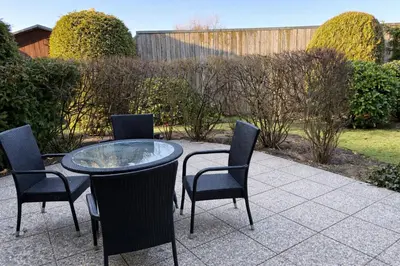 Ein Garten an der Unterkunft PrimeLoft Seebrücke - Sonne, Strand & Meer - Terasse - Parkplatz - 200m zum Strand