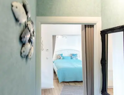 Ein Bett oder Betten in einem Zimmer der Unterkunft Ferienbungalow Kleine Hummelkate
