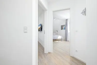 Ein Bett oder Betten in einem Zimmer der Unterkunft Haus FRIEDA, Bude B