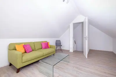 Ein Sitzbereich in der Unterkunft Haus FRIEDA, Bude B
