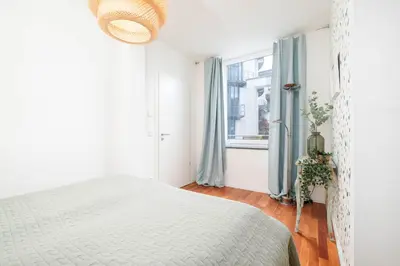 Ein Bett oder Betten in einem Zimmer der Unterkunft MeerKur