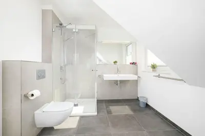 Ein Badezimmer in der Unterkunft Haus FRIEDA, Bude A