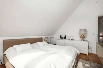Ein Bett oder Betten in einem Zimmer der Unterkunft Alsterlodge