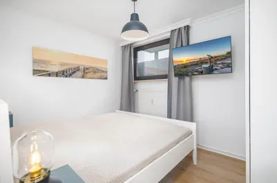 Ein Bett oder Betten in einem Zimmer der Unterkunft Haus Boy, App 1