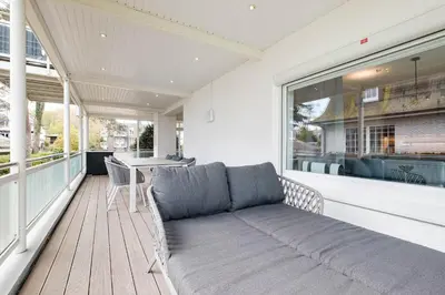 Ein Sitzbereich in der Unterkunft Strandhus Nautilus