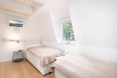 Ein Bett oder Betten in einem Zimmer der Unterkunft Strandhus Bootsmann