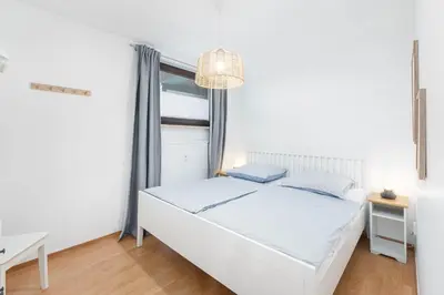 Ein Bett oder Betten in einem Zimmer der Unterkunft Haus Boy, App 7