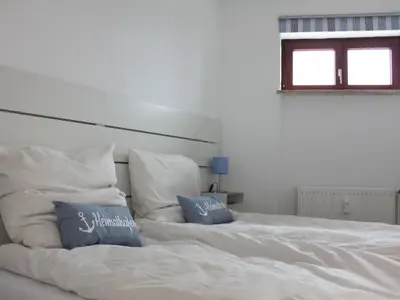 Ein Bett oder Betten in einem Zimmer der Unterkunft Apartment Gesamte Wohnung in Scharbeutz mit Großem Garten by Interhome