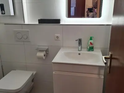 Ein Badezimmer in der Unterkunft Apartment Gesamte Wohnung in Alt Travemünde-Rönnau by Interhome