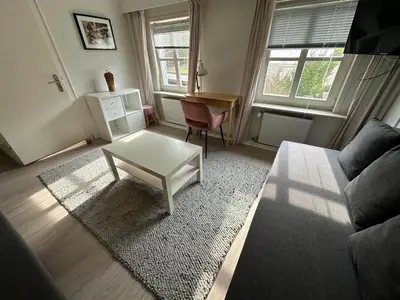 Ein Sitzbereich in der Unterkunft Apartment Neu im Angebot- Wohnung für vier Personen by Interhome