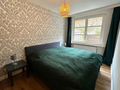 Ein Bett oder Betten in einem Zimmer der Unterkunft Apartment mit eigener Terrasse by Interhome
