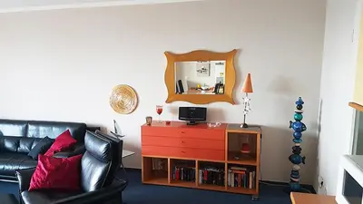Ein Sitzbereich in der Unterkunft Strandallee 50, Ferienwohnung mit direktem Meerblick