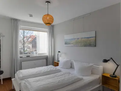 Ein Bett oder Betten in einem Zimmer der Unterkunft Objekt-Nr 148 - Strand - Achterdeck