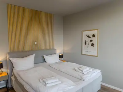 Ein Bett oder Betten in einem Zimmer der Unterkunft Objekt-Nr 182 - Strand - Kaiserallee