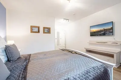 Ein Bett oder Betten in einem Zimmer der Unterkunft 2 Seasons, High Five