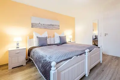 Ein Bett oder Betten in einem Zimmer der Unterkunft 2 Seasons, High Five