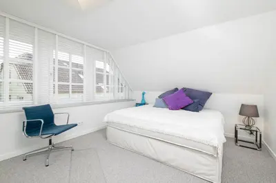 Ein Bett oder Betten in einem Zimmer der Unterkunft Ferienhaus 