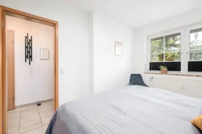 Ein Bett oder Betten in einem Zimmer der Unterkunft Gorch-Fock-Park App 20