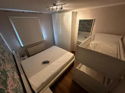 Ein Bett oder Betten in einem Zimmer der Unterkunft Ferienidyll Mariett