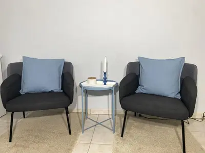 Ein Sitzbereich in der Unterkunft Haus Am Strande
