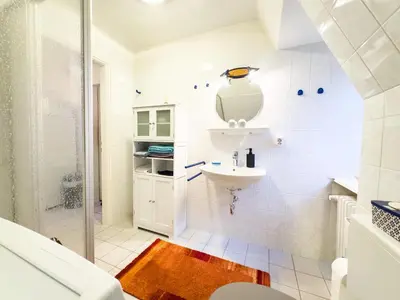 Ein Badezimmer in der Unterkunft TraveNah